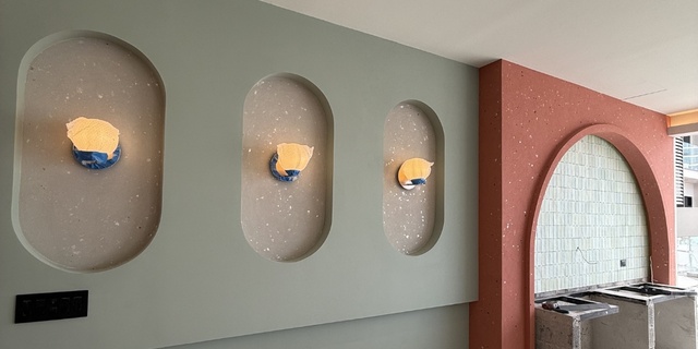 Acabados decorativos tipo cantera en The Hub